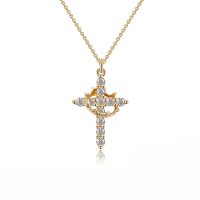 gold cross necklace with crown
