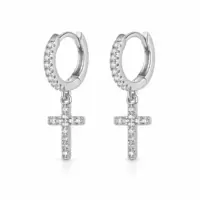Silver-tone cross huggies with claw-set clear stones and Latin cross drops, front view