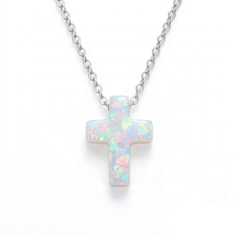 White opal cross necklace with sterling silver setting