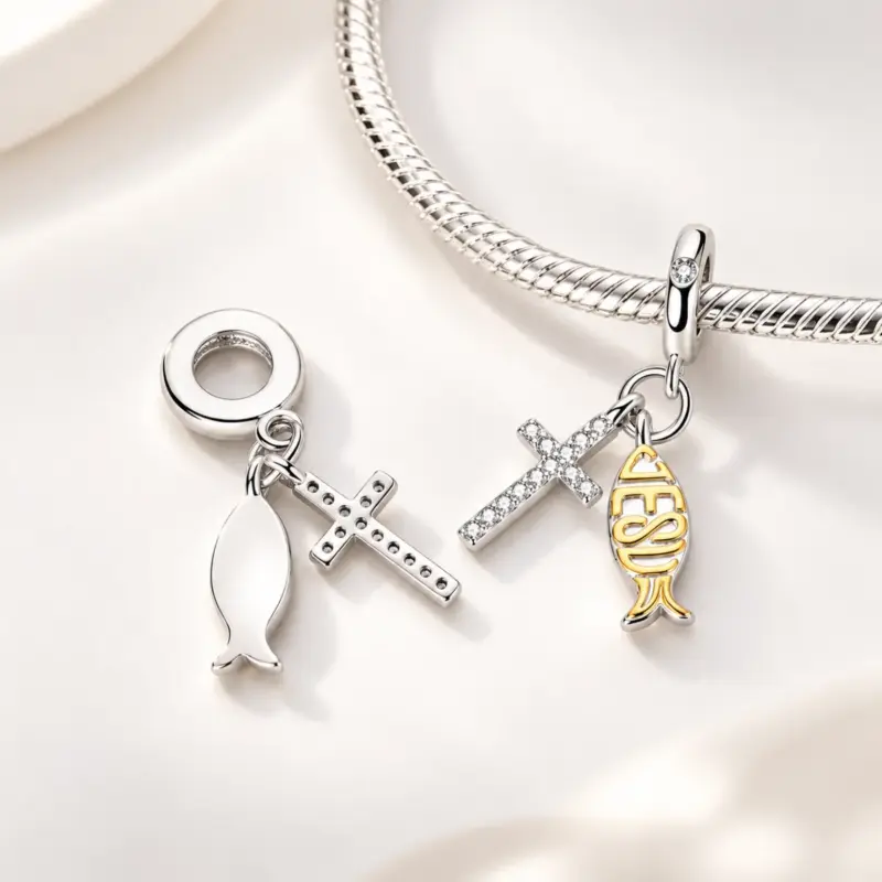 fish with cross charm tiberia Silver cross and Jesus fish dangle on snake chain bracelet, second charm showing plain back