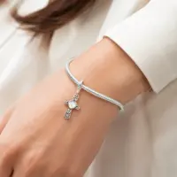 gothic-cross-charm-wear-at-woman-wrist