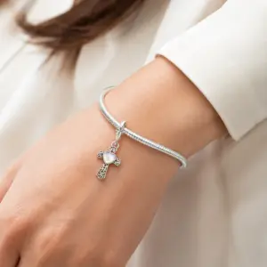 gothic-cross-charm-wear-at-woman-wrist