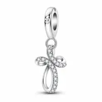 Sterling silver infinity cross dangle charm with one diagonal line of clear CZ, white background