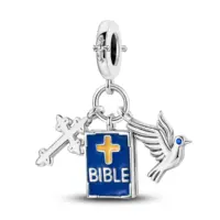 Silver Bible charm shown front and back beside a snake chain bracelet on pastel background