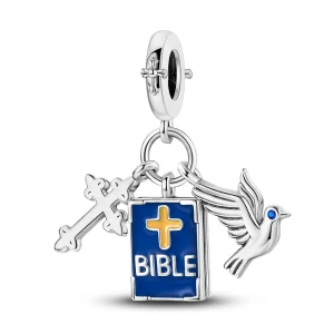 Silver Bible charm shown front and back beside a snake chain bracelet on pastel background