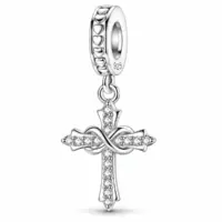 Silver cross dangle with infinity loop and clear stone rows, heart-patterned bail stamped 925