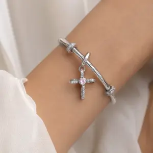 sparkling cross dangle charm caritas