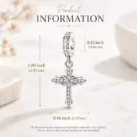 Sterling CZ cross charm sized at 1.00 in tall and 0.46 in wide