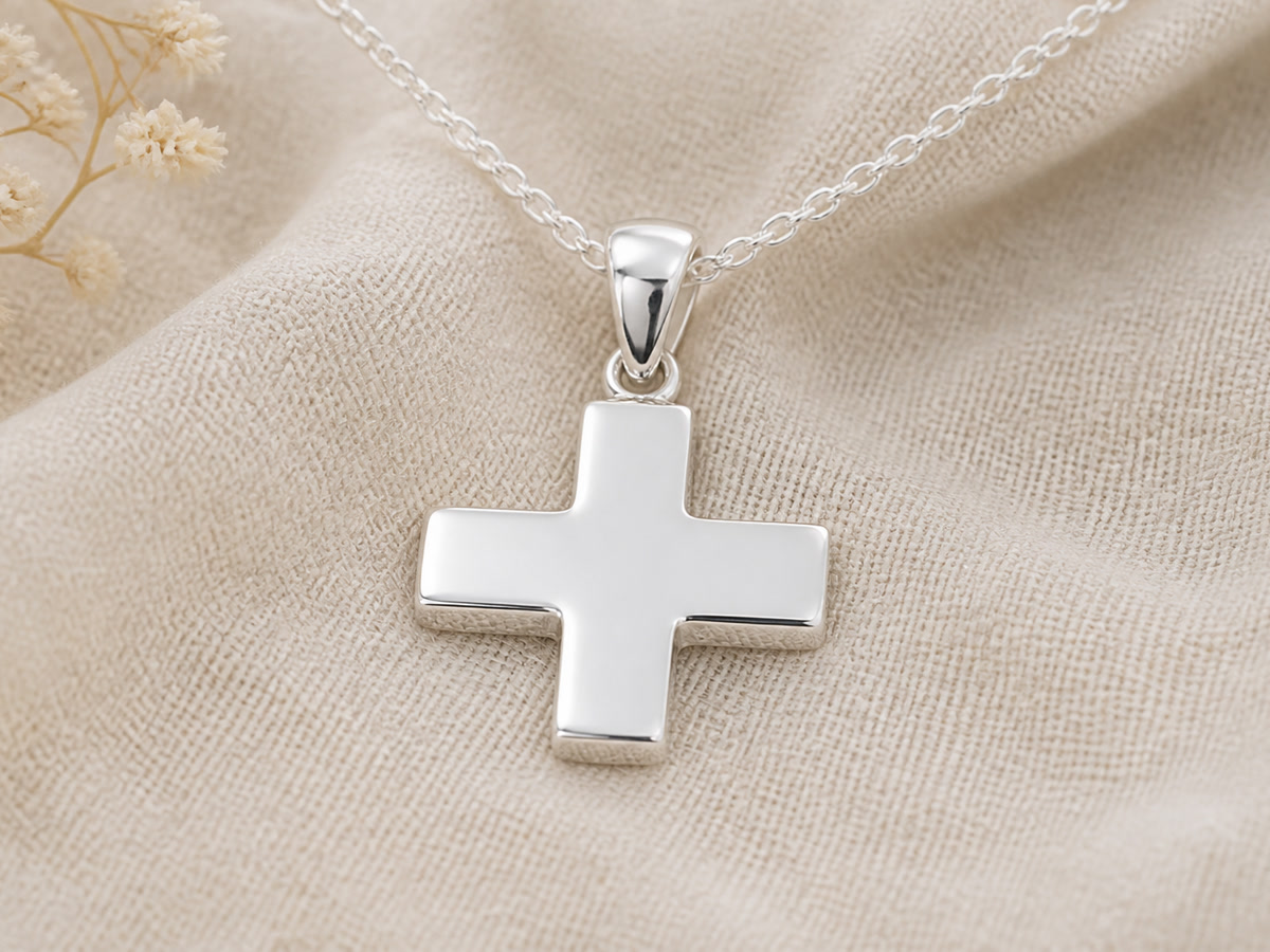 Greek cross pendant with four equal arms in polished sterling silver on a delicate chain