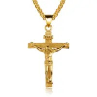 Gold crucifix necklace with INRI titulus and textured cross arms on a box chain