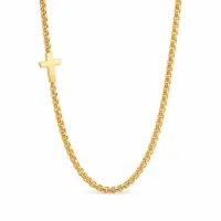 Gold box chain necklace with a small polished cross set into the links, white background